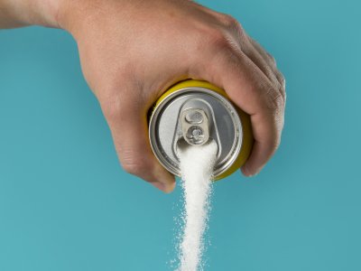 sugar being poured from a can