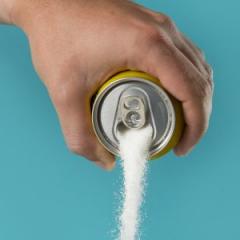 sugar being poured from a can